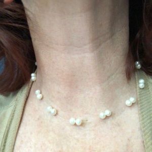 White pearl floating illusion necklace